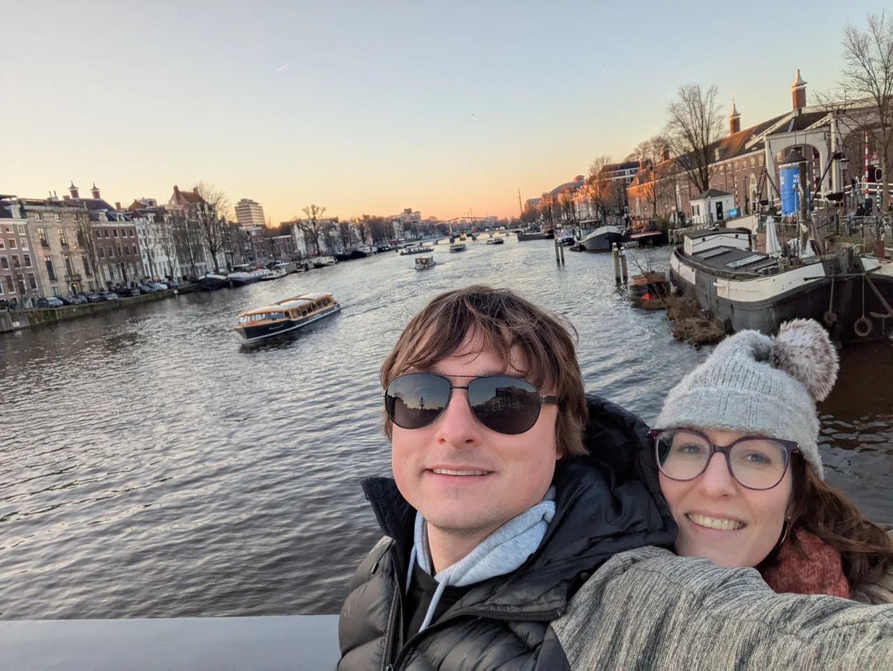 Hannah and Mike together above a canal at sunset